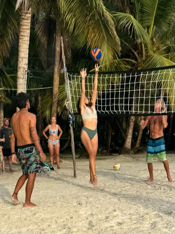 Beach volleyball under the palm trees