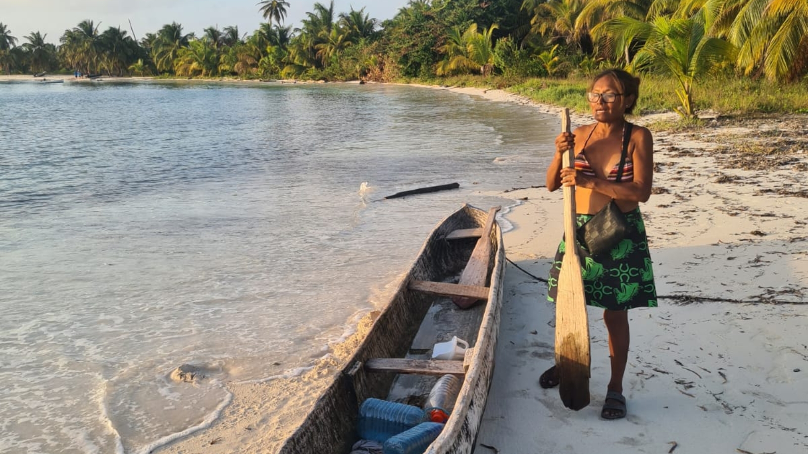 Sailing boat anchored near a Kuna village in the San Blas Islands.